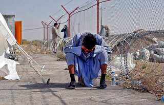 Afghans pour into Iran border as Taliban take control