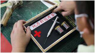 Malaysia: Covid vaccine paper mock-ups in demand during religious festival
