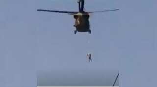 Viral video: Taliban pilot a US Black Hawk helicopter with a body hanging from it