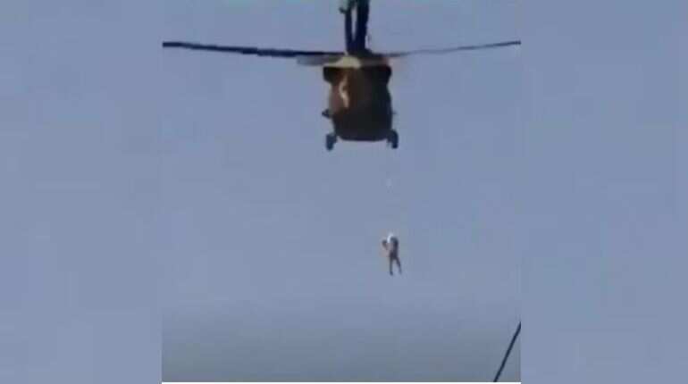 Viral video: Taliban pilot a US Black Hawk helicopter with a body hanging from it