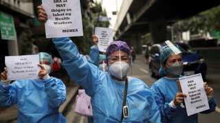 Philippines health workers protest neglect as COVID-19 strains hospitals