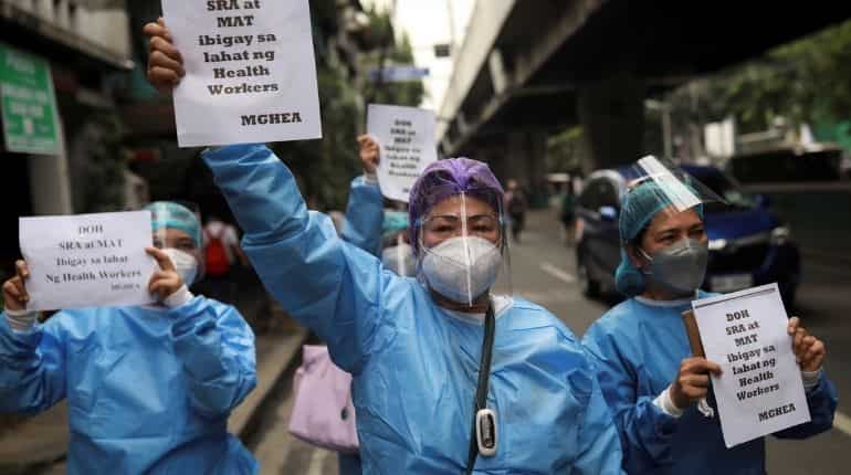 Philippines health workers protest neglect as COVID-19 strains hospitals
