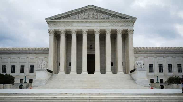 US Supreme Court backs high school football coach in praying on field after games