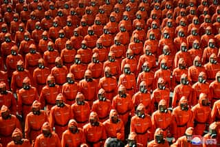 Coronavirus effect: North Koreans parade on National Day wearing hazmat suits
