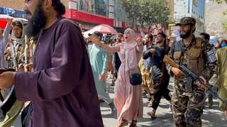 Taliban use whips and sticks on Afghan women protesting the all-male government