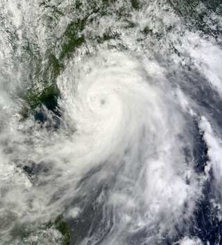 Taiwan prepares as weakening typhoon approaches