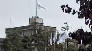 Taliban raise flag on Afghan presidential palace as US marks 9/11 anniversary