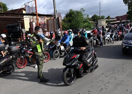 Philippines eases virus lockdown in capital to spur economy despite WHO warning Philippines eases virus lockdown in capital to spur economy despite WHO warning