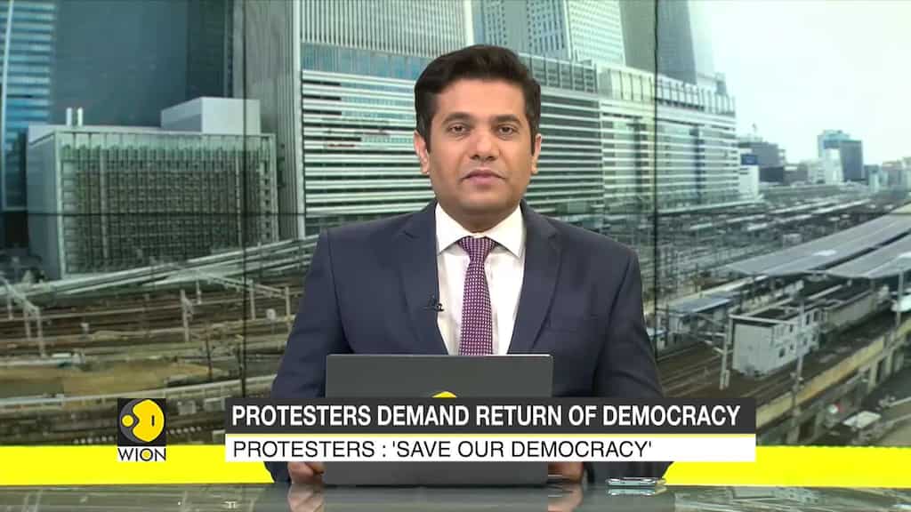 Protesters march on the streets of Tunisia over president’s seizure of powers