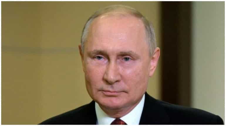 Don't worry, everything's fine, says Putin after coughing repeatedly amid virus fears