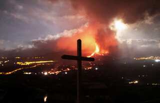 Volcano lava in Spain's Canary Island gushes towards sea, eruption goes on