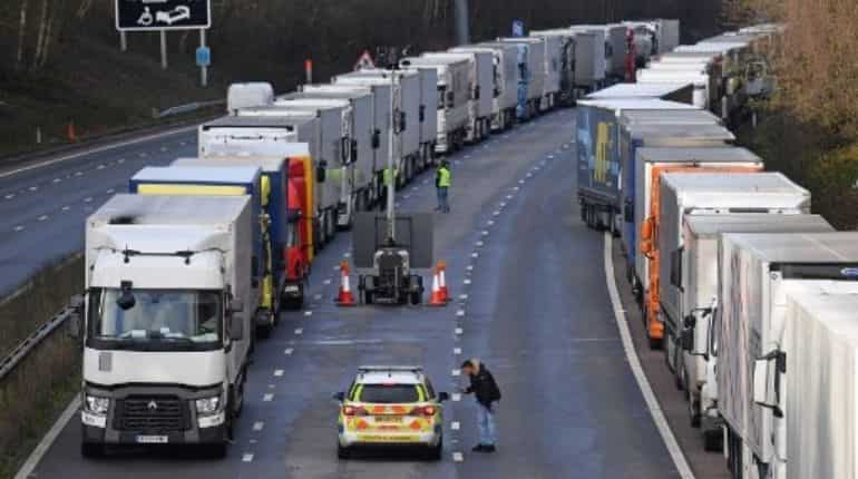 UK to issue temporary visas to ease truck driver shortage until Christmas eve UK to issue temporary visas to ease truck driver shortage until Christmas eve