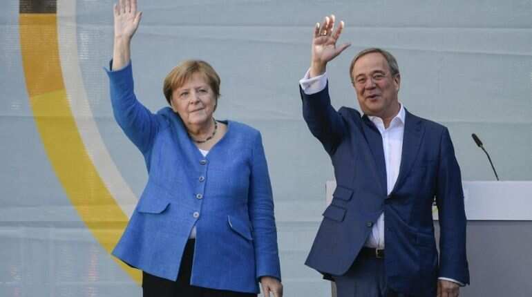 Germany elections: Angela Merkel makes final push for successor in Germany's knife-edge polls Germany elections: Angela Merkel makes final push for successor in Germany's knife-edge polls
