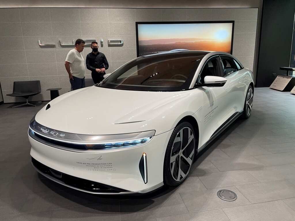 DO NOT PUBLISH ucid to start deliveries of electric cars with range exceeding Tesla's