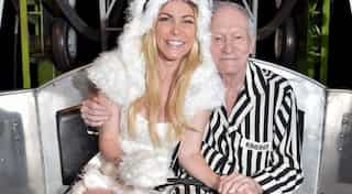 Playboy founder Hugh Hefner's wife defends him against criticism from exes