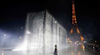 Paris Fashion Week: Yves Saint Laurent makes a splash with Eiffel Tower runway