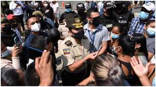 Ecuador seeks to identify remains of 116 inmates killed in prison riot