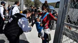 Even as activists accuse country of illegal deportation, Greek PM says 'essentially crushed' migrant smugglers