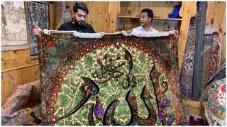 Craftsman uses calligraphy on Kashmiri silk carpets, demand increases