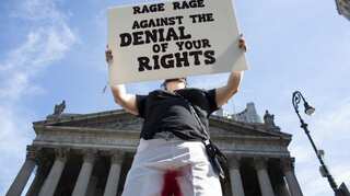 'Mind your uterus': Protests erupt in US against anti-abortion laws