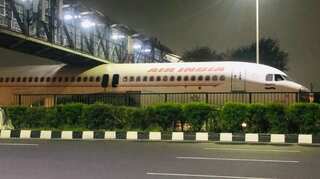 Watch: Scrapped Air India plane gets stuck under a foot-over bridge in Delhi