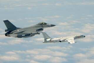 China sends 56 warplanes into Taiwan's defence zone in largest-ever air incursion
