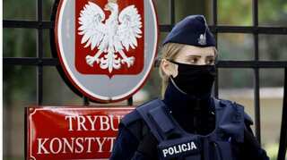 France and Germany say Poland must abide by EU rules