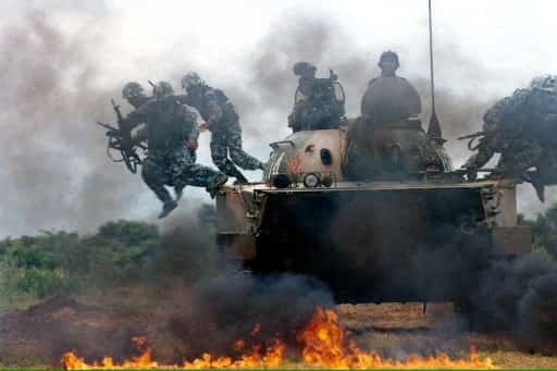 President Xi wants China to 'break new ground' while developing weapons