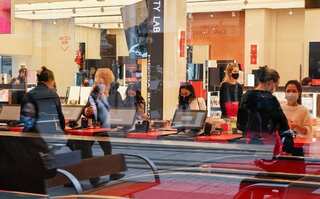 Sydney eases more COVID-19 curbs as vaccinations pass milestone