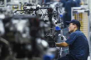 China’s economy continues to slow, rattled by real estate and energy