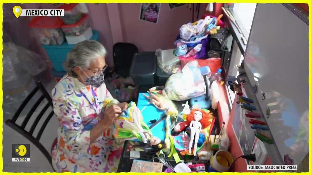 Woman in Mexico crafts Day of the Dead dolls to increase income