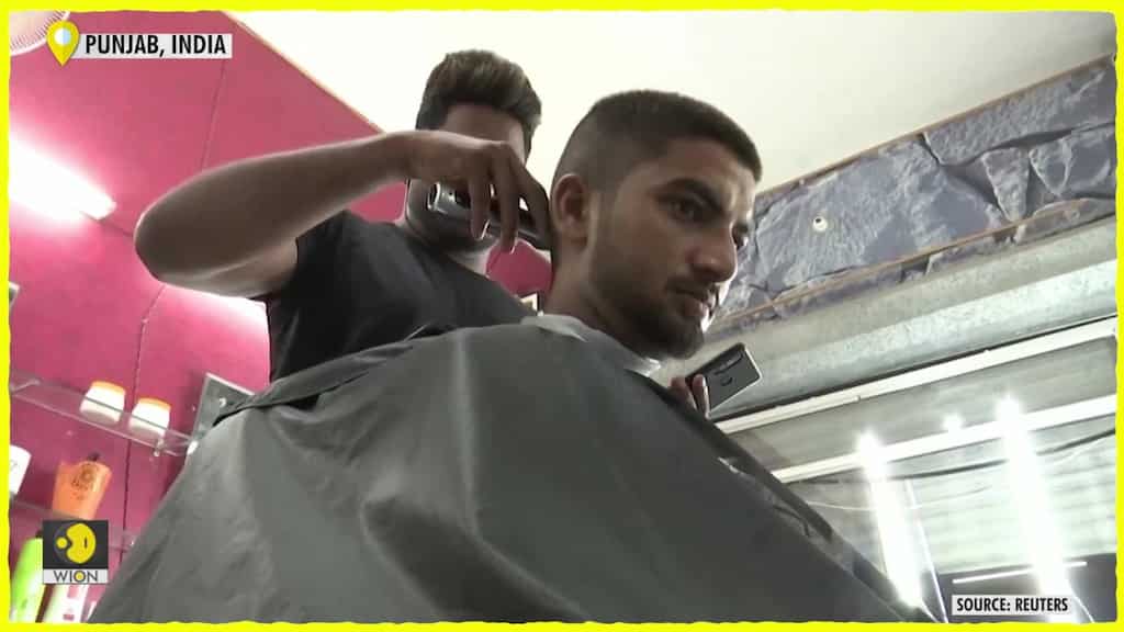 Indian barber brothers turn heads into canvases