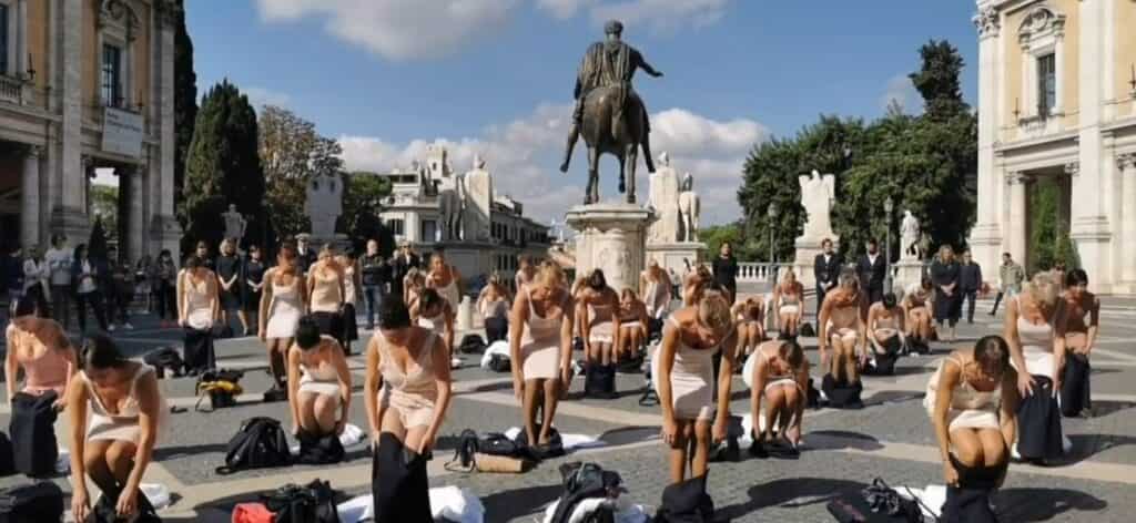 Former Alitalia flight attendants strip down in protest against ITA airways