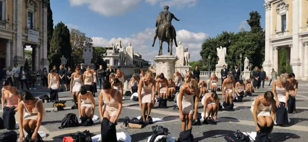 Former Alitalia flight attendants strip down in protest against ITA airways
