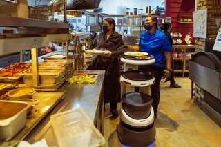 Desperate for workers, restaurants turn to robots