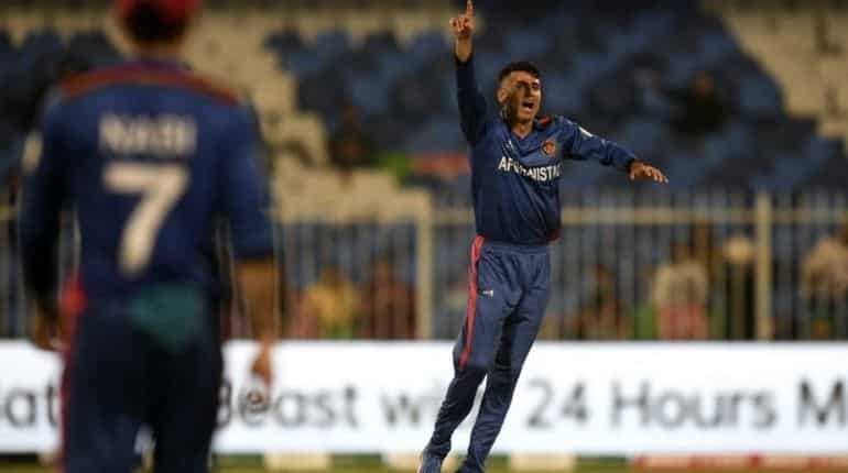 T20 World Cup: Mujeeb Ur Rahman and Rashid Khan help Afghanistan thrash Scotland by 130 runs T20 World Cup: Mujeeb Ur Rahman and Rashid Khan help Afghanistan thrash Scotland by 130 runs