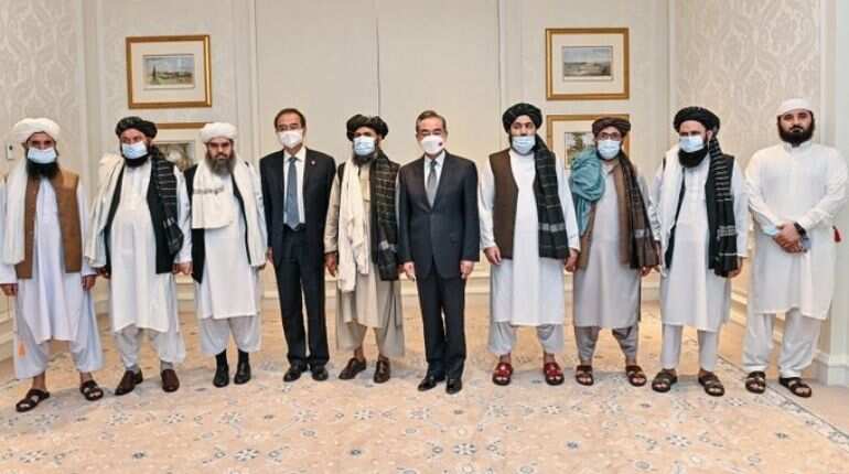 Chinese FM Wang Yi meets Taliban's acting Deputy PM Baradar in Doha