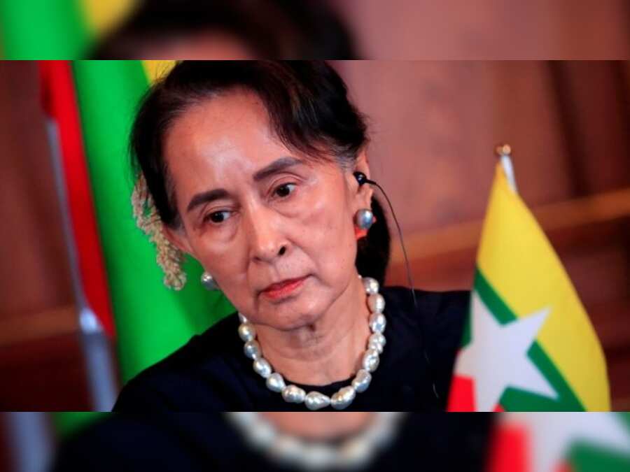 Myanmar's ousted leader Aung San Suu Kyi appears in court wearing prison uniform