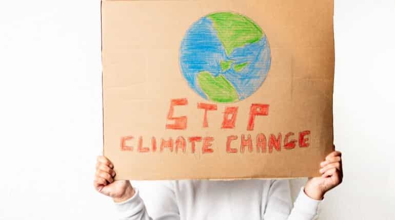 Poorer countries spend five times more on debt than climate crisis – report