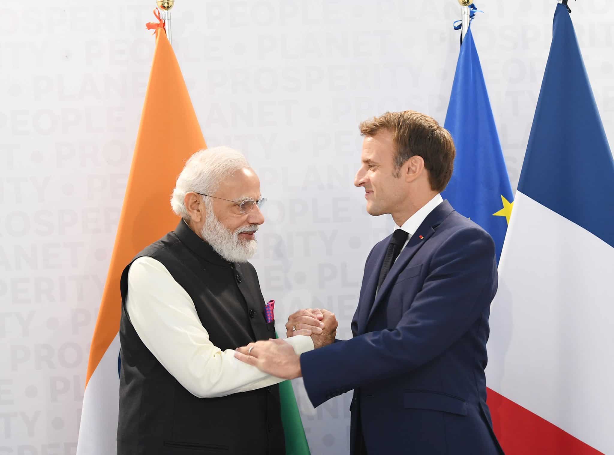 PM Modi interacts with French President Macron on the sidelines of G20