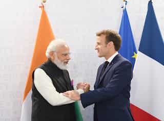 PM Modi interacts with French President Macron on the sidelines of G20