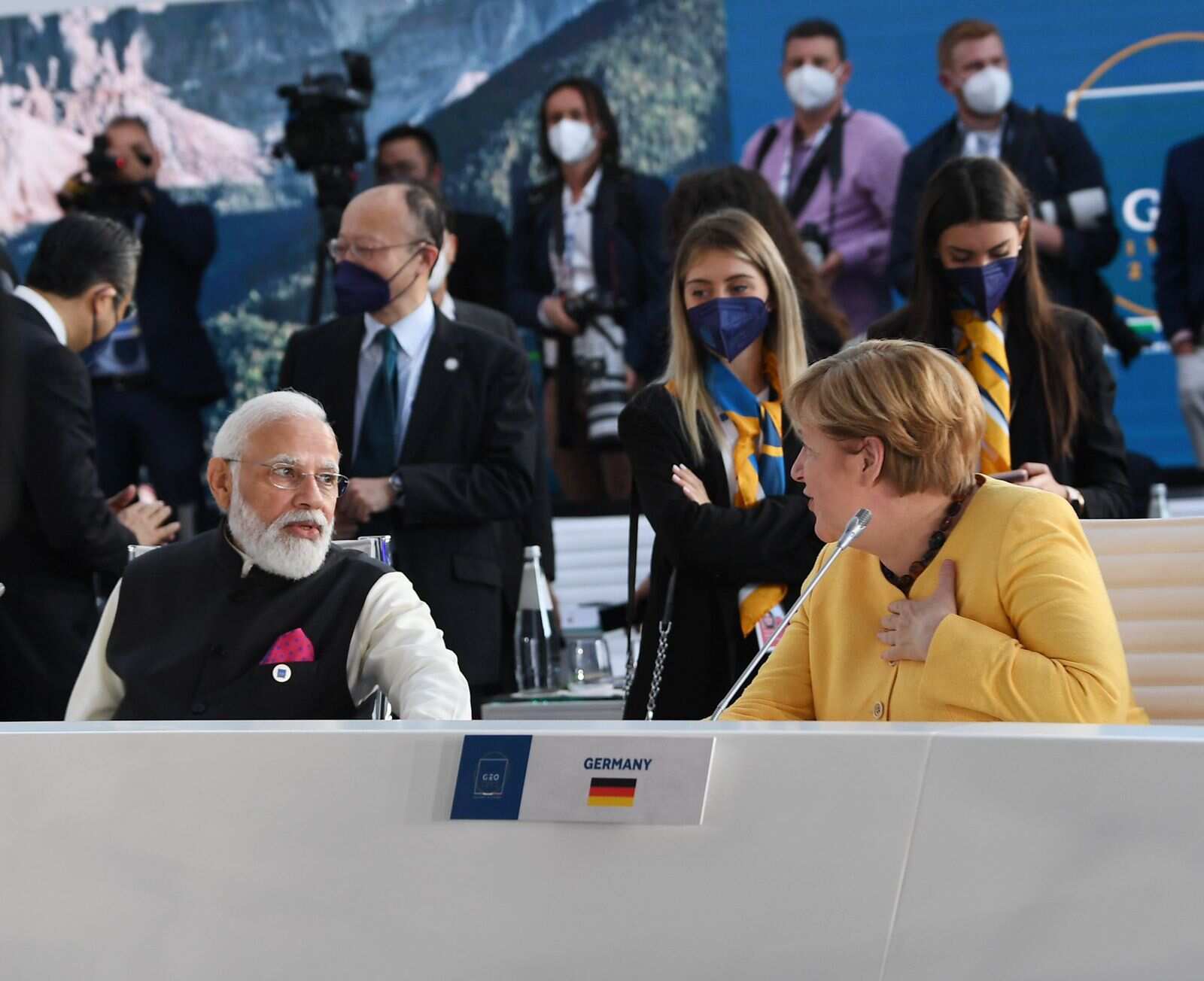 PM Modi interacting with Angela Merkel
