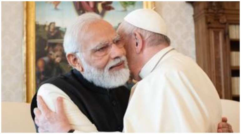 PM Modi gifts silver candle stand, book on India's commitment on environment to Pope Francis PM Modi gifts silver candle stand, book on India's commitment on environment to Pope Francis