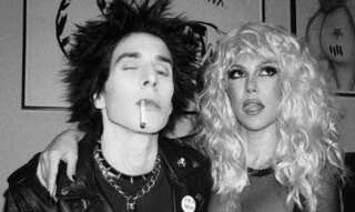 Travis Barker is 'much better’ after 'life-threatening' pancreatitis, wife Kourtney calls it emotional week