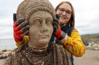 'Utterly astounding finds': Archaeologists find Roman statues while excavating English church