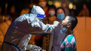 Chinese school locks down kids overnight after one Covid case