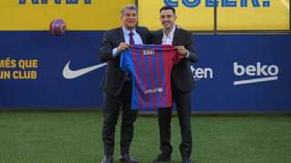 Barcelona unveil Xavi Hernandez as new manager in front of thousands at Camp Nou