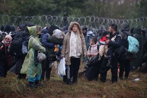 'Orchestrated influx': Poland blocks migrants at Belarus border as it warns of an 'armed' escalation 'Orchestrated influx': Poland blocks migrants at Belarus border as it warns of an 'armed' escalation