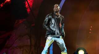 Travis Scott performs for the first time in public after Astroworld tragedy