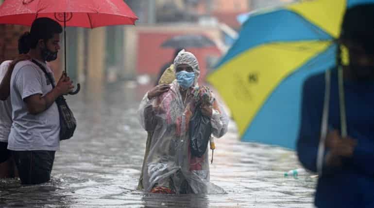 'Rush, save his life at any cost': Lady cop lifts unconscious man, takes him to safety, amid Chennai rains